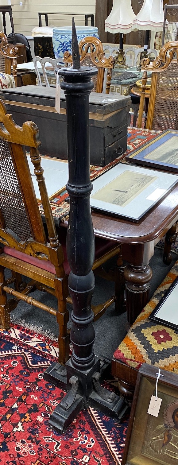 A pair of painted turned wood and wrought iron pricket candlestands, height 144cm